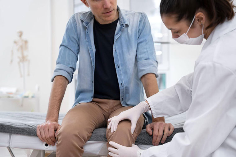 doctor helping patient